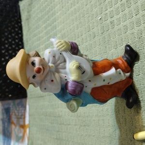 Vintage Ucgc, Circus clown with guitar porcelain figurine.